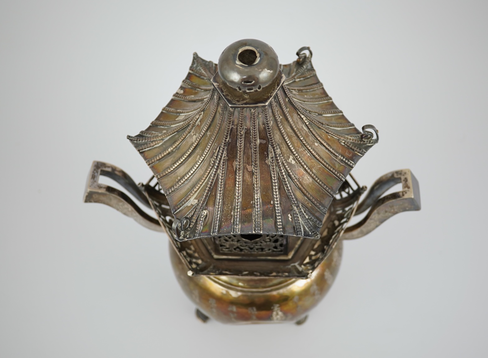 An unusual Chinese silver tripod censer with pagoda shaped cover, ding, early 20th century